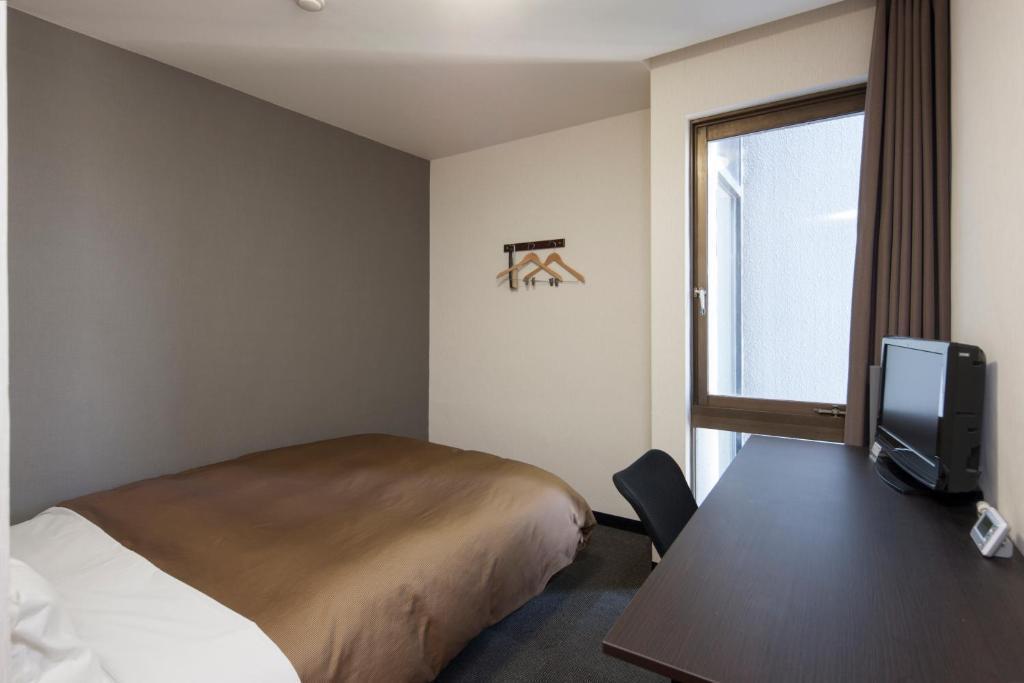 Hotel Plaza Inn Τοκουσίμα Δωμάτιο φωτογραφία