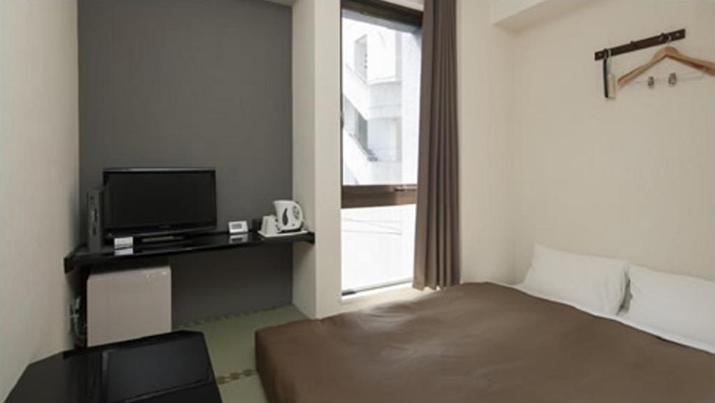 Hotel Plaza Inn Τοκουσίμα Δωμάτιο φωτογραφία